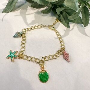 Gold charm bracelet